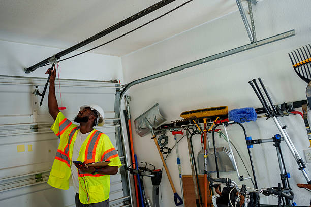 Professional Garage Door Panel Replacement technician working in Henry County County, VA